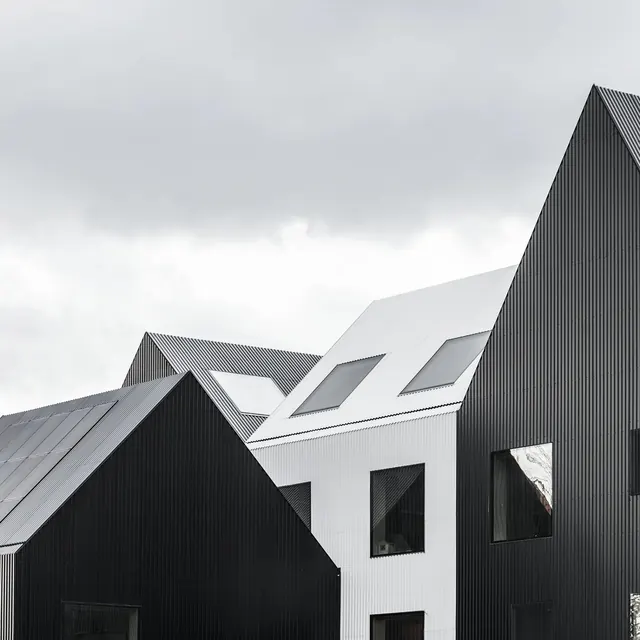 Modern architecture corrugated metal buildings, photographic, minimalist, dark