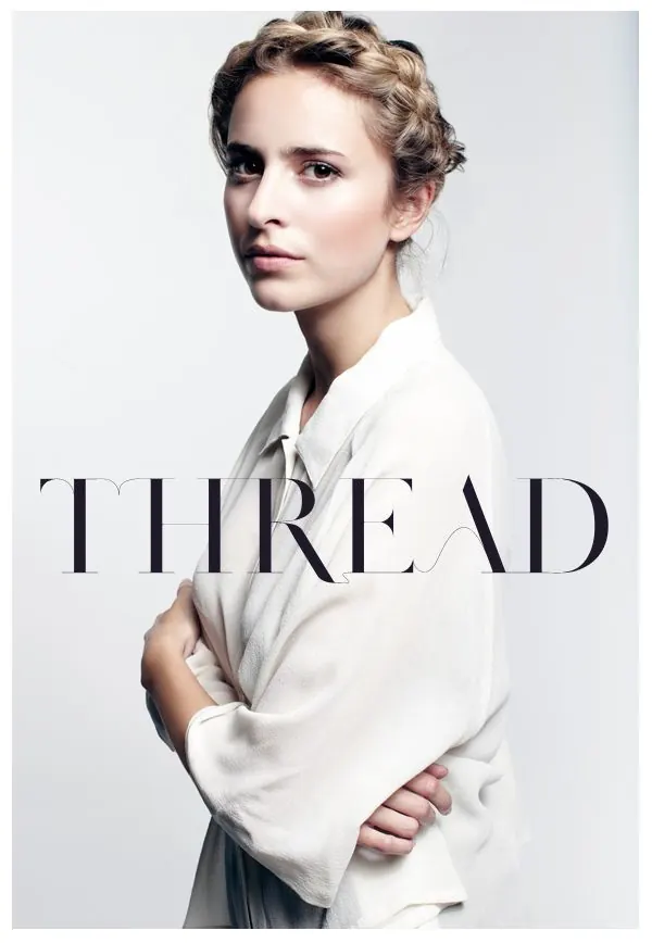 Fashion editorial with minimalist typography overlay, photographic, editorial, light