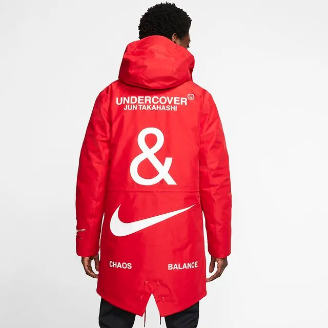 Nike x Undercover red jacket product photography, photographic, minimal, vibrant
