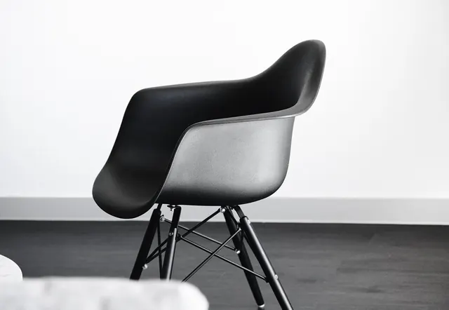 Modern eames-style shell chair, photographic, minimal, light