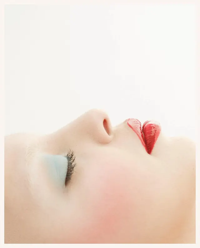 Beauty close-up with lip color and eye shadow, photographic, minimal, pastel
