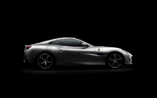 Silver sports car on black background, photographic, technical, monochrome