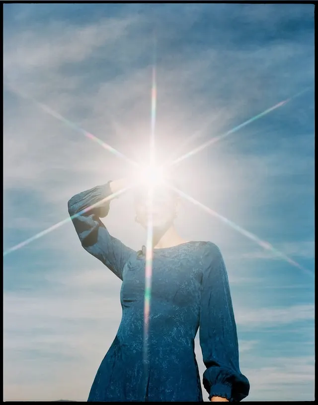 Lens flare silhouette portrait, photographic, editorial, cool