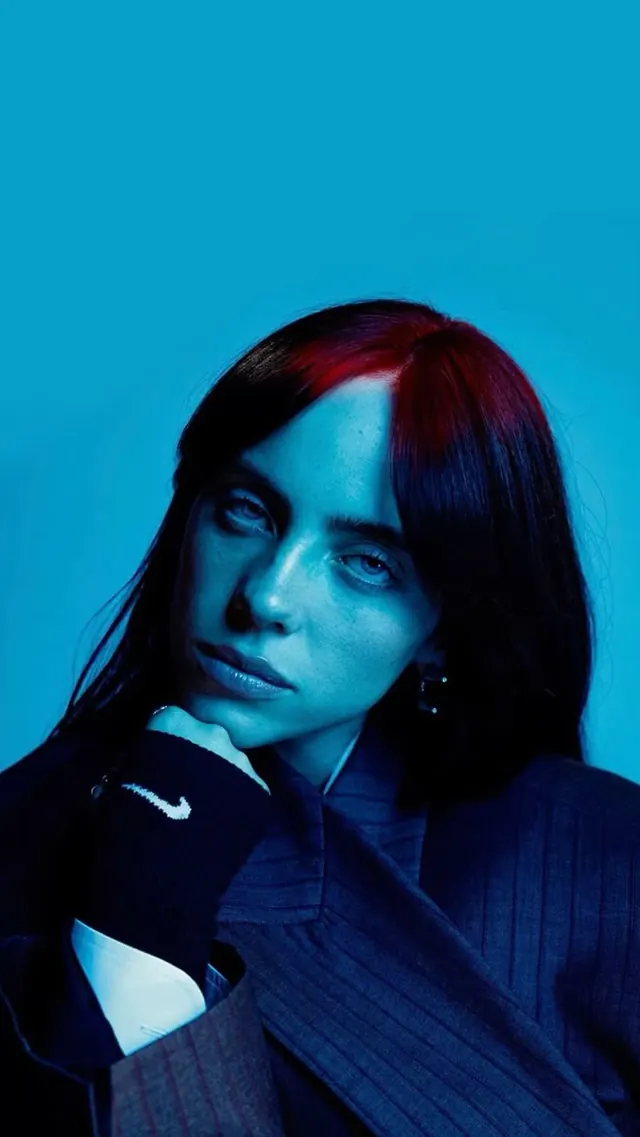 Portrait with split-tone cyan and magenta, photographic, dark-mode, vibrant