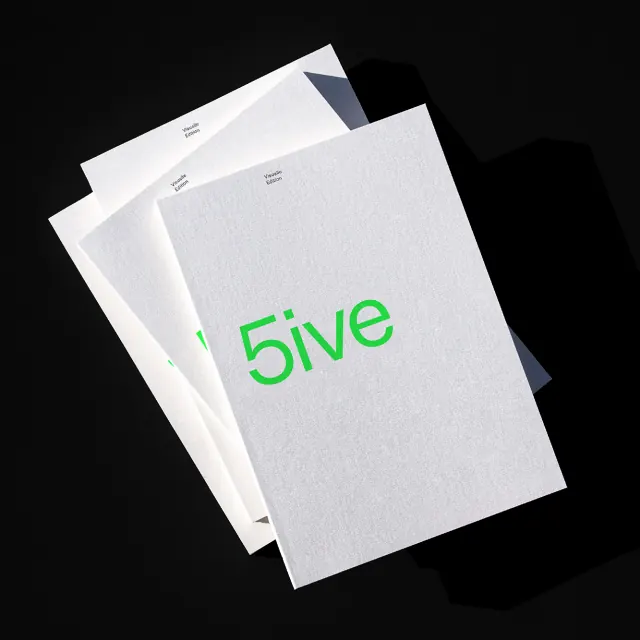 Stacked papers or cards with green accent, minimal, technical, light
