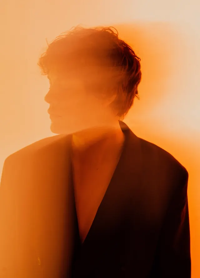 Blurred Portrait with Warm Overlay