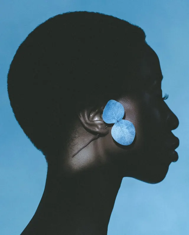Profile Silhouette with Blue Earring