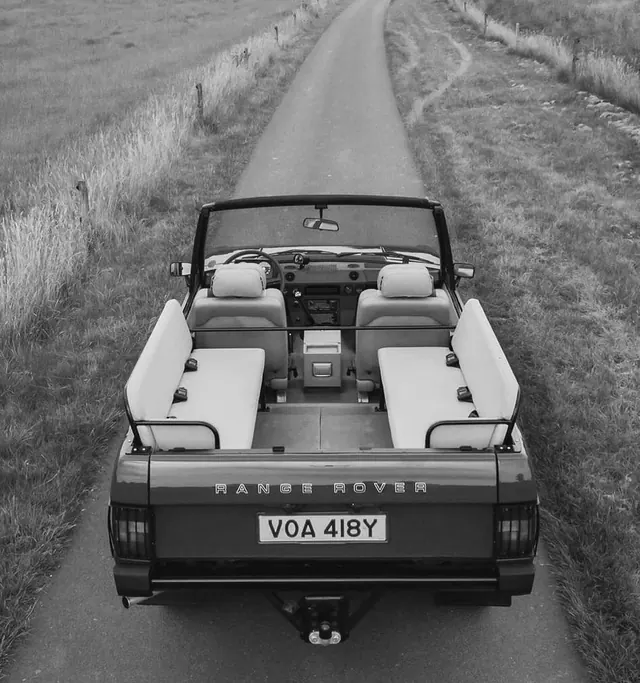 Vintage Land Rover on Country Road