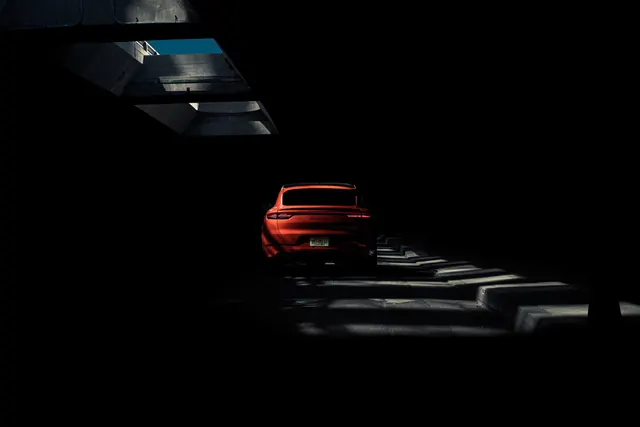 Red Car in Dark Studio