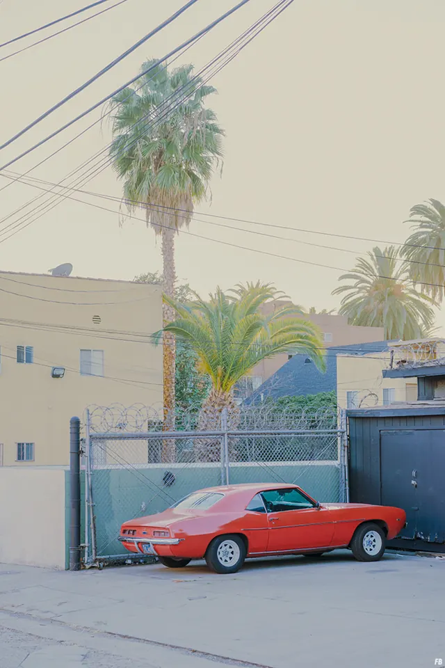 Red Sedan in Urban Setting