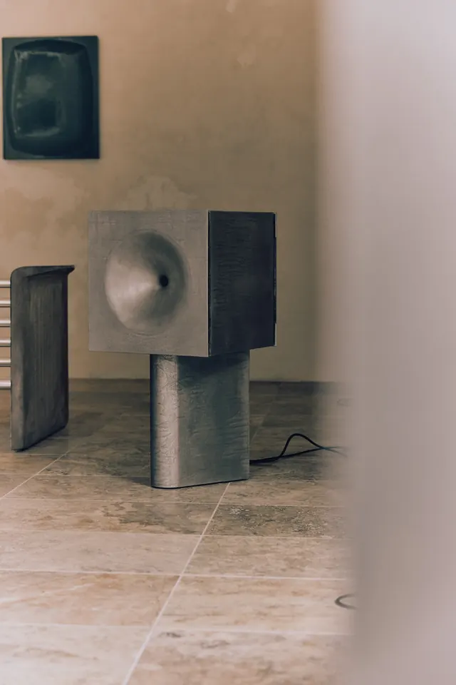 Minimalist Architectural Interior with Geometric Speakers