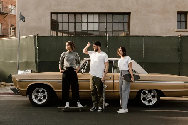 Group of four men with vintage car
