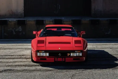 Red Sports Car in Industrial Setting