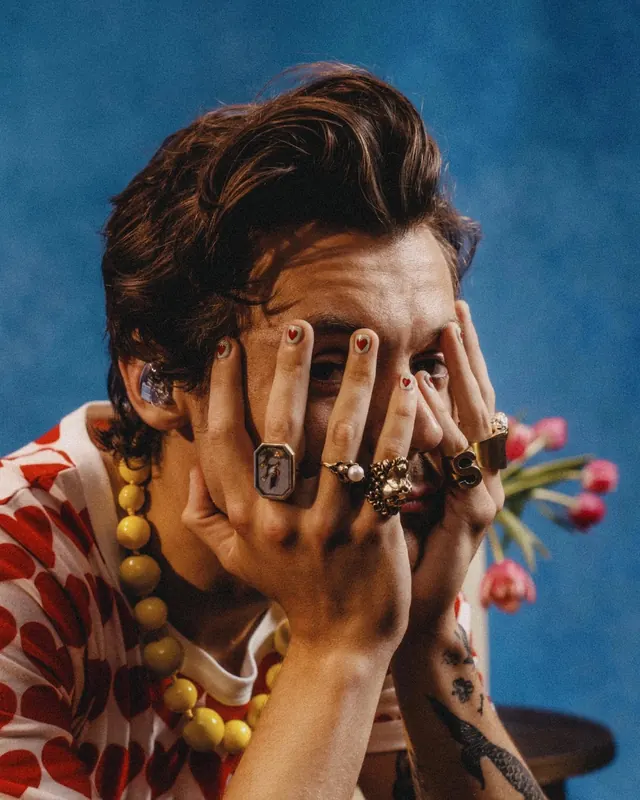 Portrait of a man with jewelry and accessories