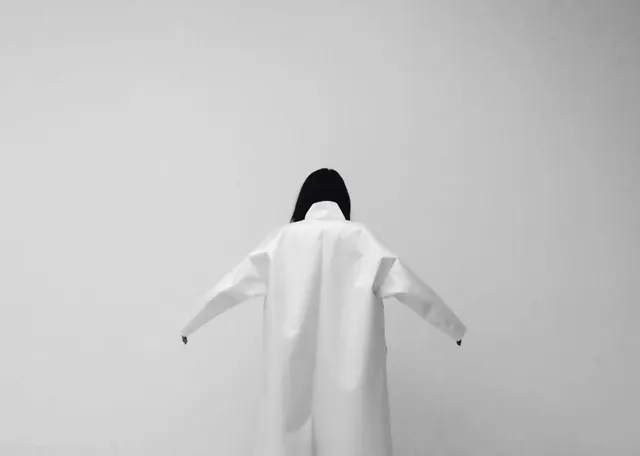 Minimalist Figure in White Garment