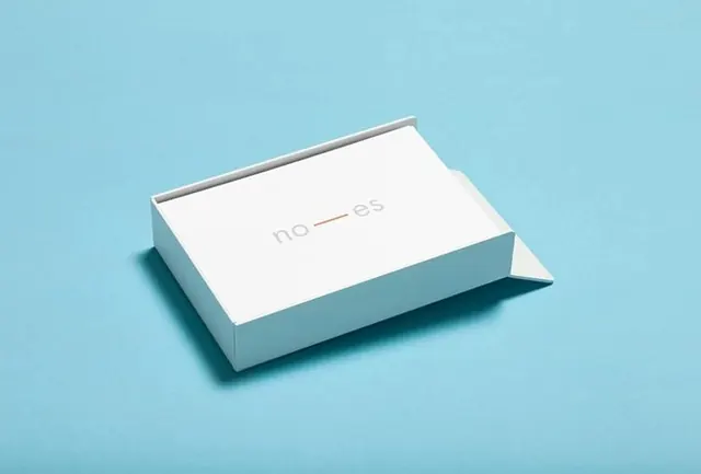 Minimal white product box on solid blue, minimal, light