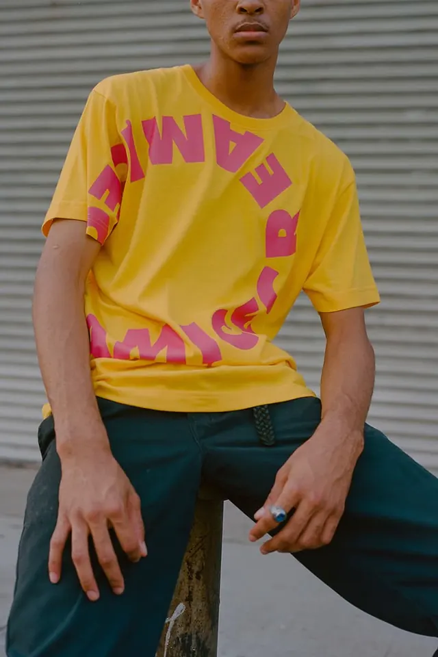 Model in yellow Ice Cream graphic t-shirt, photographic, vibrant