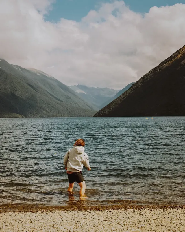 Person Standing in Lake