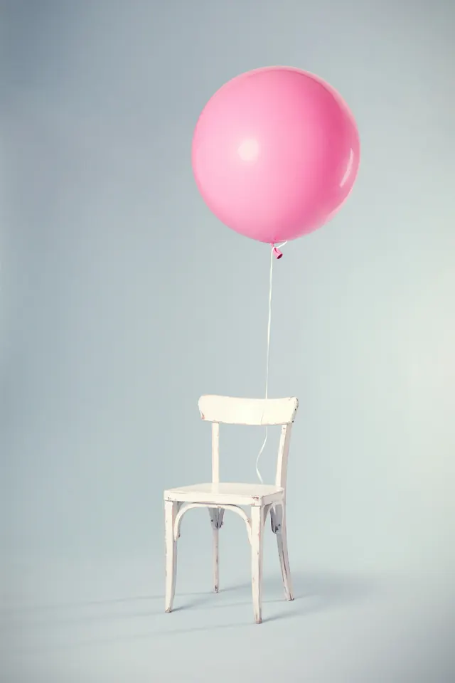 Pink Balloon and White Chair