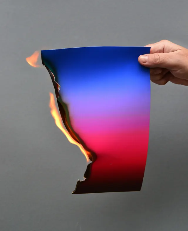 Burning paper with gradient and fire effect, photographic, gradient-heavy, gradient