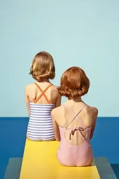 Two girls with backpacks