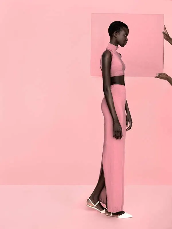 Model in pink knit set with pink panel, photographic, editorial, pastel