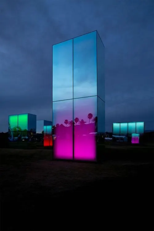 Glowing glass cube installation with palm silhouettes, photographic, minimal, dark
