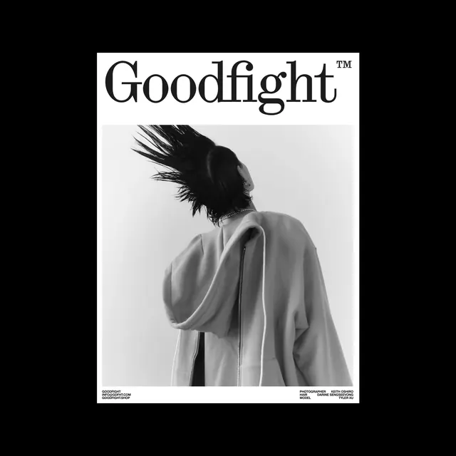 Goodfight studio fashion portrait with dramatic hair, photographic, minimal, monochrome