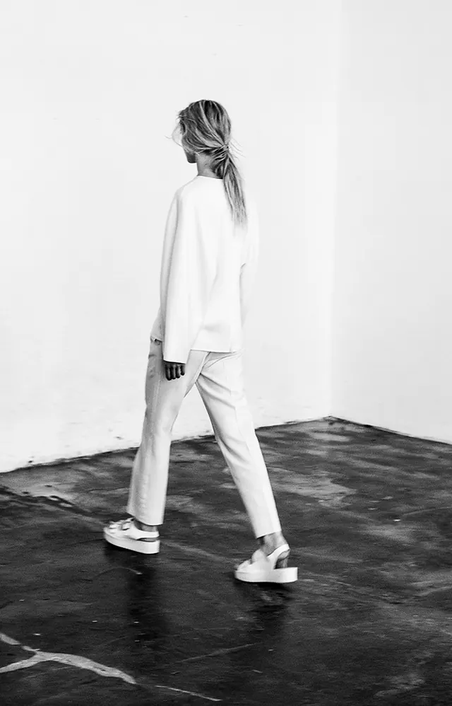 Monochrome fashion photograph with split levels, monochrome, photographic, dark