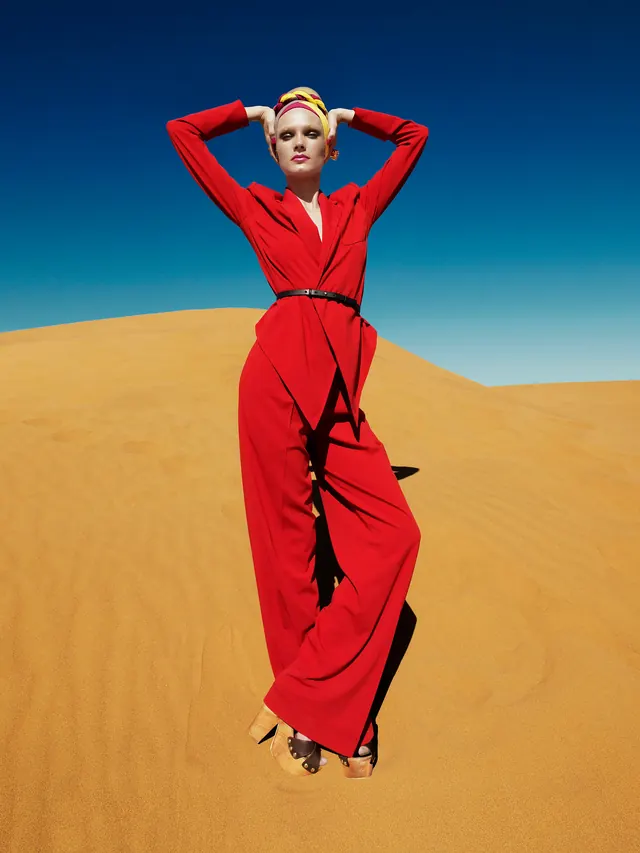 Woman in Red Jumpsuit in Desert