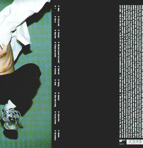 Editorial Fashion with Vertical Tracklist, photographic, minimal, dark