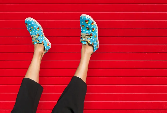 Red Background with Patterned Shoes