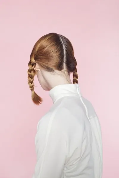 Portrait of a woman with braided hair