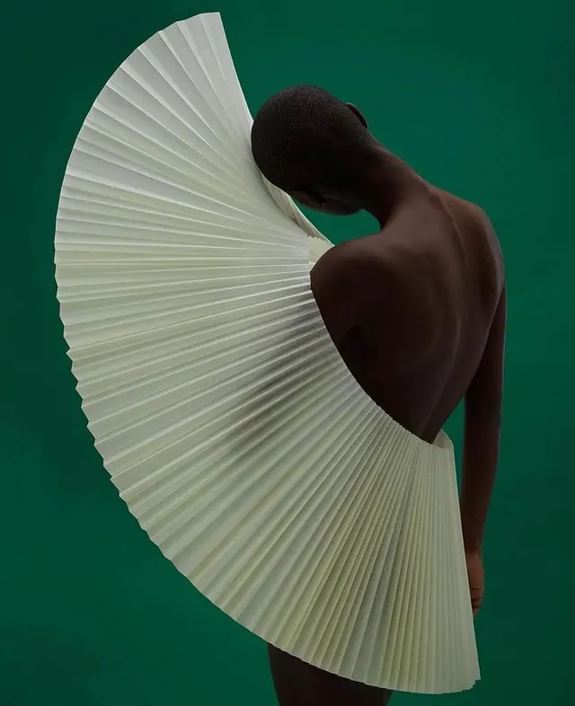 Abstract Figure with Pleated Fan