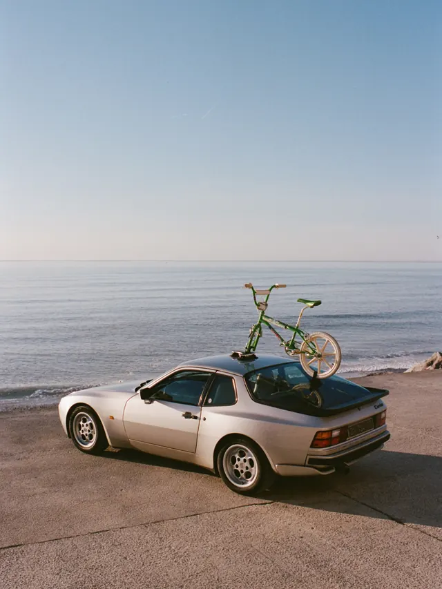 Car and Bicycle on Beach