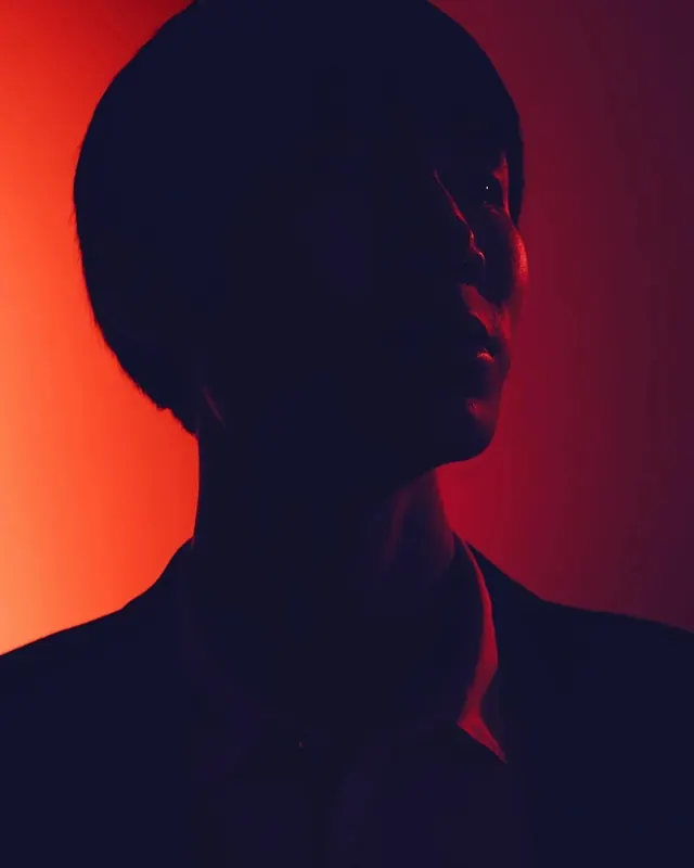 Silhouette Portrait with Red Gradient