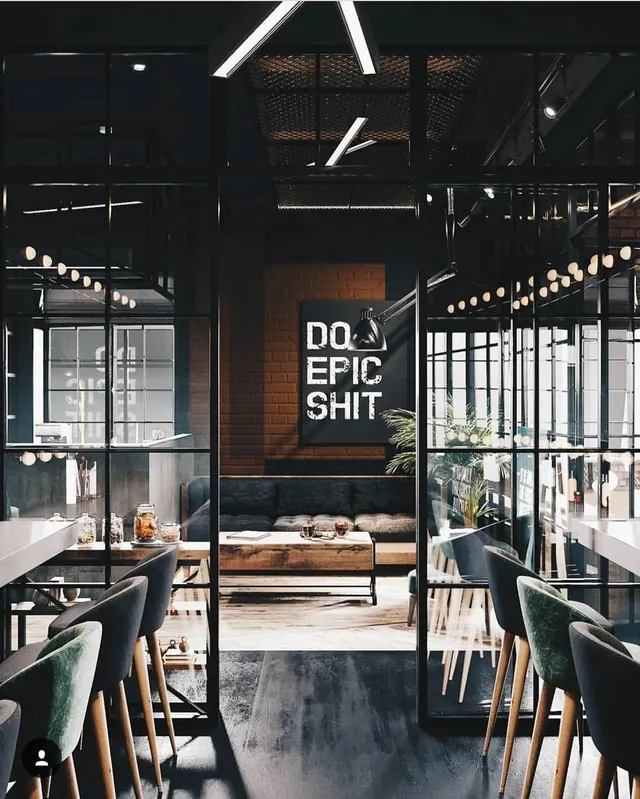 Industrial office interior with bold wall graphic, photographic, dark