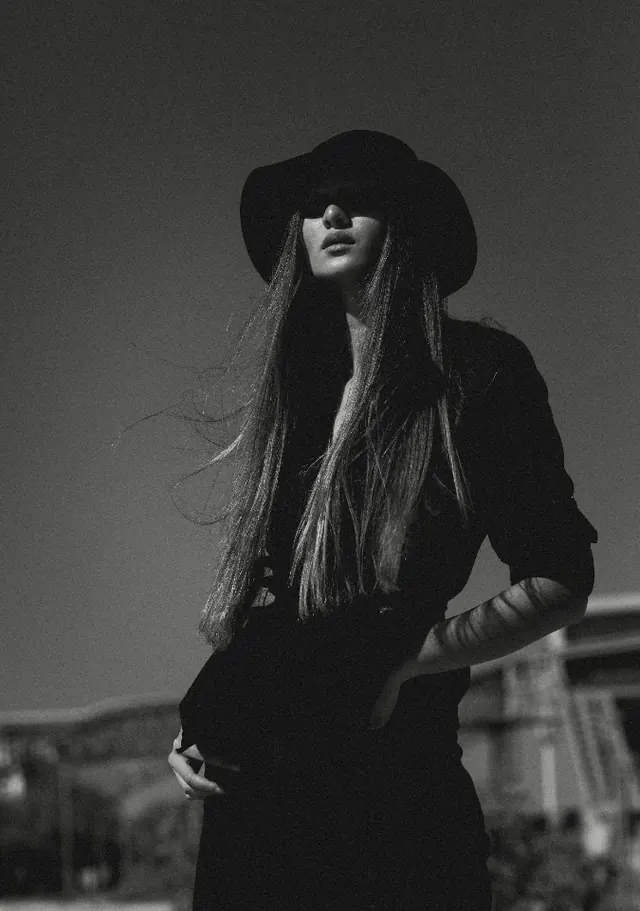 Monochrome Portrait of Woman in Hat
