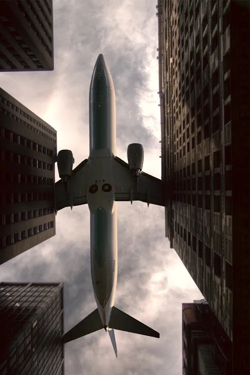 Airplane in Urban Canyon