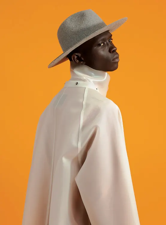 Portrait of a person in a wide-brimmed hat
