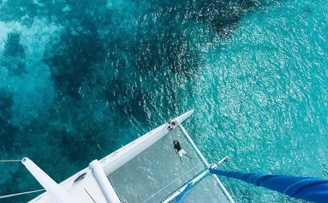 Aerial View of Boat on Turquoise Water