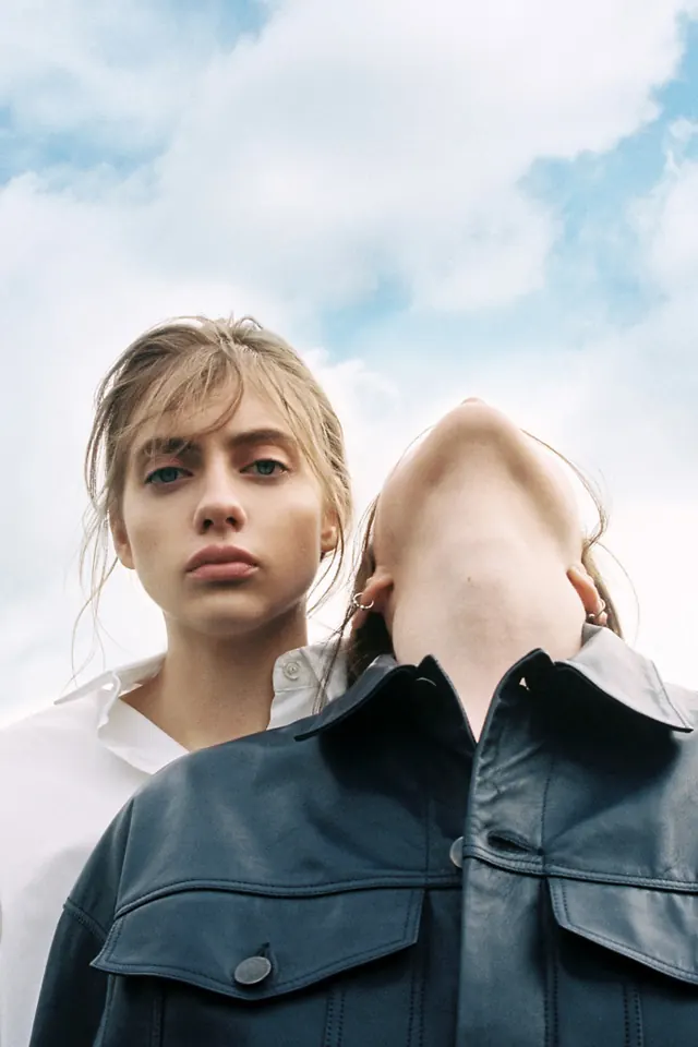 Portrait of Two Figures in Leather Jackets