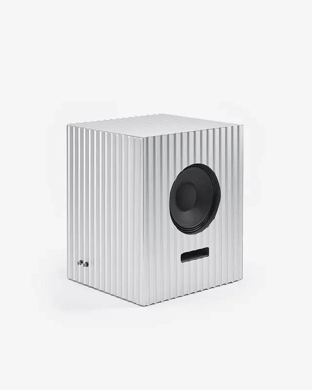 White ribbed speaker product shot, minimal, geometric, light