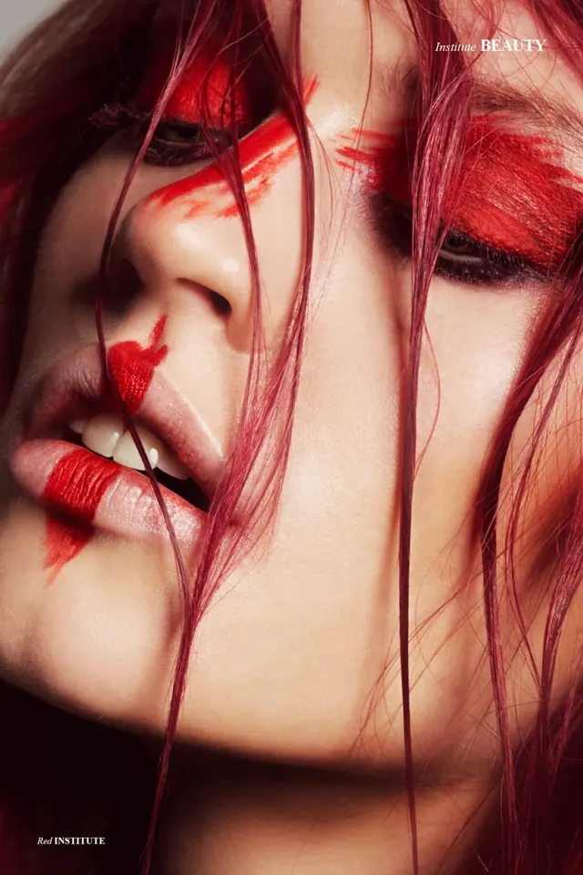 Dramatic red makeup beauty close-up, editorial, photographic, vibrant