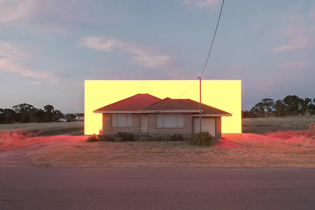 House with Glowing Yellow Backdrop