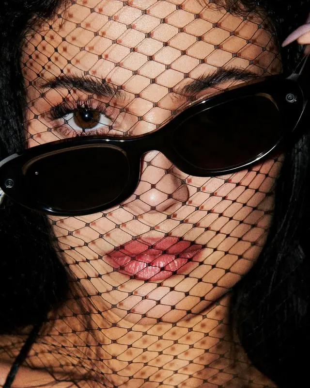 Portrait with fishnet veil and sunglasses, photographic, editorial, dark