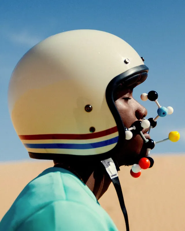 Colorful sphere helmet character with molecular structure, playful, 3d-render, vibrant