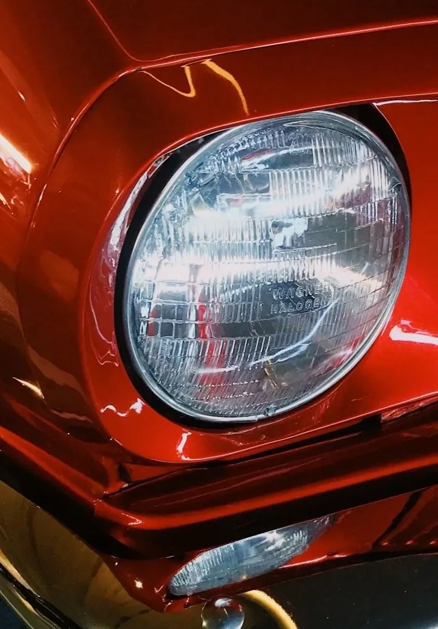 Red Vehicle Headlight Detail