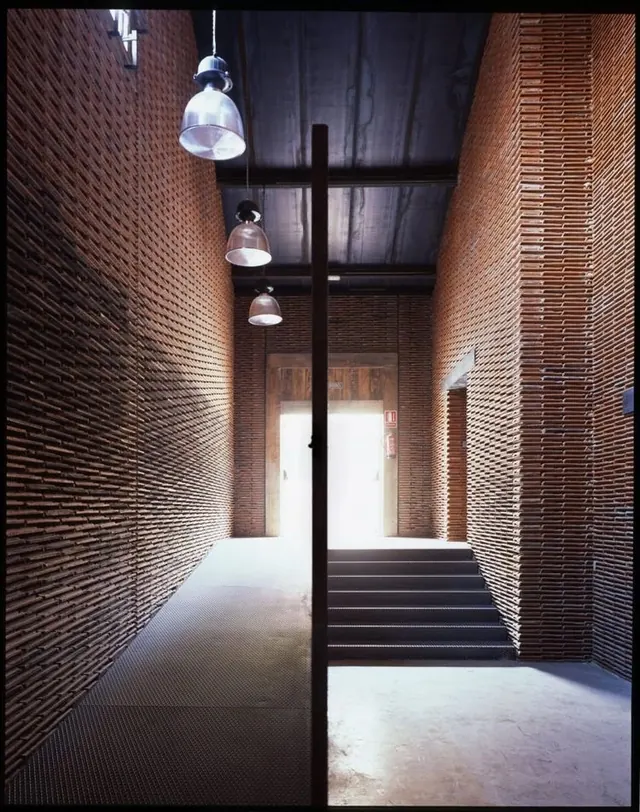 Brick hallway with hanging pendants, minimal, photographic, dark