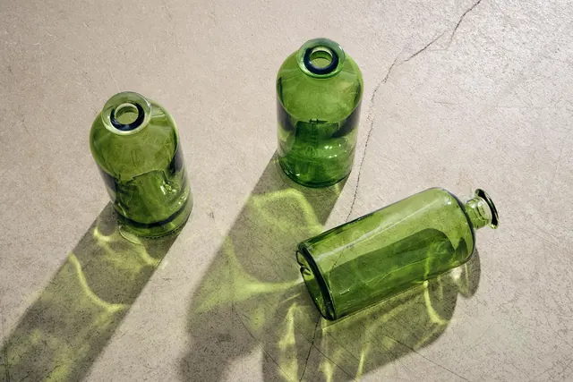 Green Glass Bottles with Shadows